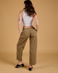 Baggy Mid-Rise Trousers in Desert Brown back view on Alex