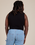 Muscle Tee in Basic Black back view on Demi