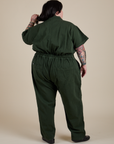 Short Sleeve Jumpsuit in Swamp Green back view on Sam