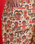 Close up of Shahana's hand in the back pocket of Hot Stuff Drop Pocket Cargo Pants