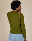 Long Sleeve Baby Tee in Summer Olive back view on Jerrod