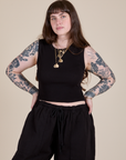 Sydney is 5'9" and wearing XXS Muscle Tee in Basic Black