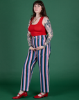 Angled front view of Work Pants in Pacific Stripe and mustang red Cropped Tank on Sydney