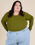 Sam is 5’10” and wearing XL Long Sleeve Baby Tee in Summer Olive