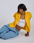 Pantry Button-Up in Sunshine Yellow and light wash Denim Drop Pocket Pants worn by Kira