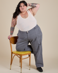 Work Pants in Washed Grey and Tank Top in Vintage Tee Off-White worn by Sam