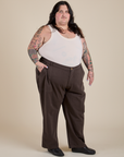 Angled front view of Work Pants in Espresso Brown and Tank Top in Vintage Tee Off-White on Sam