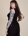 Angled back view of Muscle Tee in Basic Black on Sydney