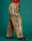 Close up side view of the Leopard Drop Pocket Pant on Kandia