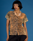 Kira wearing the Tiger Pantry Buttoned Up