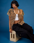 Kira wearing the Tiger Pantry Button Up with the Black Drop Pocket Pant