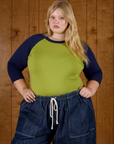 Juliet wearing the Gross Green/Navy Colorblock Raglan Tee
