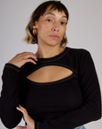 Close up Tiara wearing the Black Porthole Long Sleeve Tee