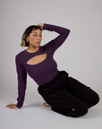Tiara wearing the Nebula Purple Long Sleeve Porthole Tee with Black Drop Pocket Pants
