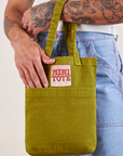 Mini Tote Bag in Olive Green on Jesse's arm