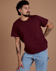 Jesse is 5'8" and wearing S Burly Tee in Red Wine