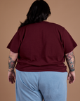 Burly Tee in Red Wine back view on Sam