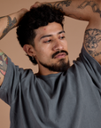 Front close up of Burly Tee in Washed Grey on Jesse