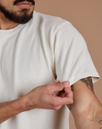Close up of Burly Tee in Vintage Tee White sleeve on Jesse