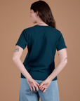 Burly Tee in Lagoon back view on Alex