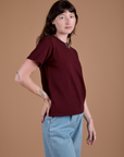Angled front view of Burly Tee in Red Wine on Alex