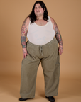 Sam is 5'10" and wearing 2XL Corduroy Drop Pocket Cargo Pants in Khaki Grey paired with a Tank Top in Vintage Tee Off-White