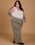 Angled front view of Corduroy Drop Pocket Cargo Pants in Khaki Grey and Tank Top in Vintage Tee Off-White on Sam