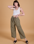 Alex is wearing Corduroy Drop Pocket Cargo Pants in Khaki Grey and Cropped Tank in Vintage Tee White