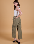 Angled back view of Corduroy Drop Pocket Cargo Pants in Khaki Grey on Alex