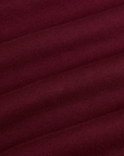 Fabric close up of the Red Wine Long Sleeve Baby Tee