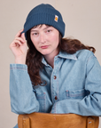 Alex is wearing Ribbed Beanie in French Blue