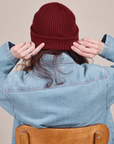 Back view of Ribbed Beanie in Red Wine on Alex