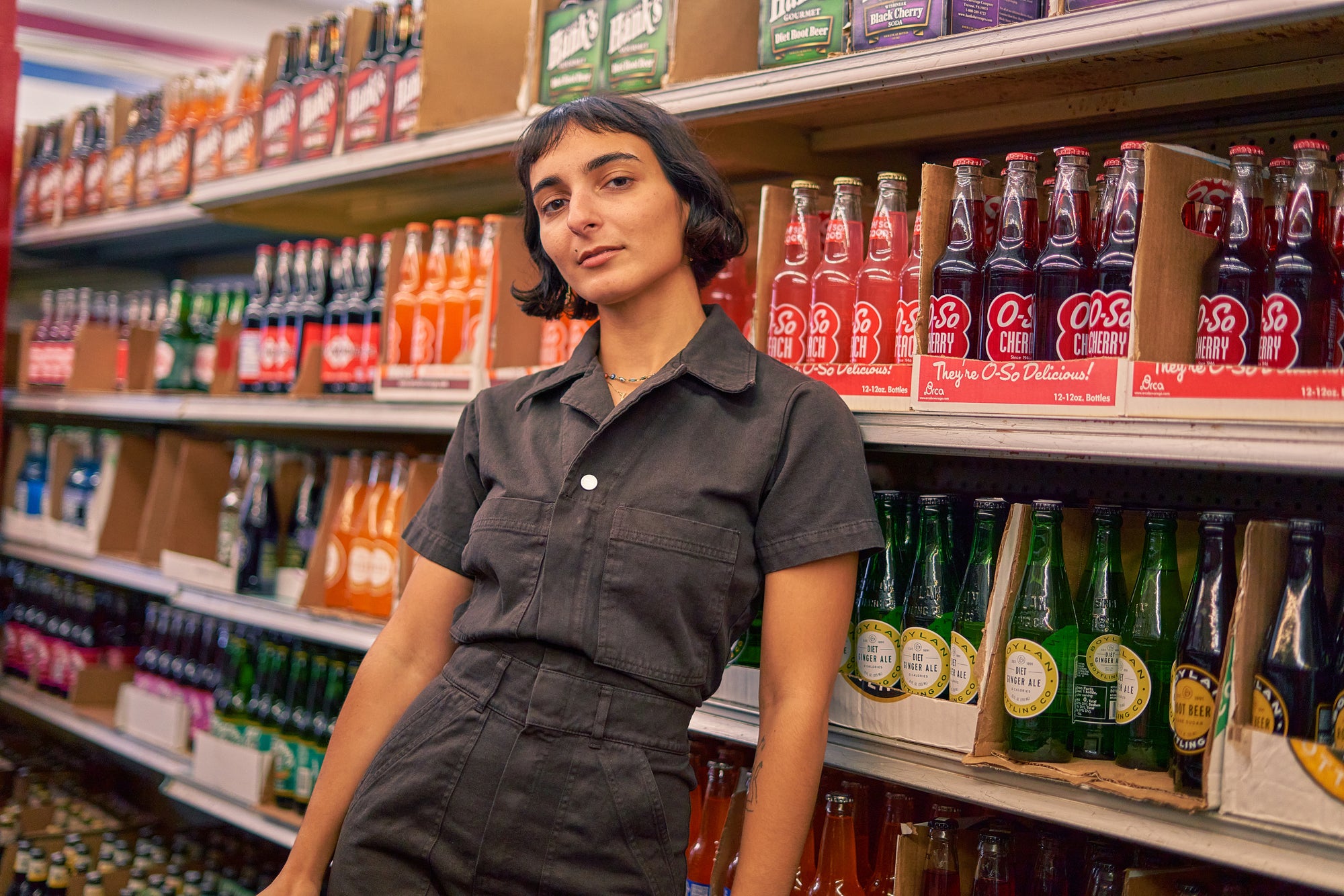 Soraya wearing Short Sleeve Jumpsuit in Espresso Brown