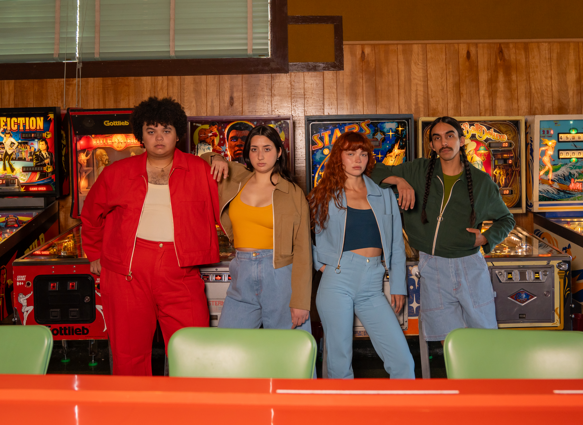 Anthony, Sadie, Miguel and Betty are all wearing Mechanic Jackets