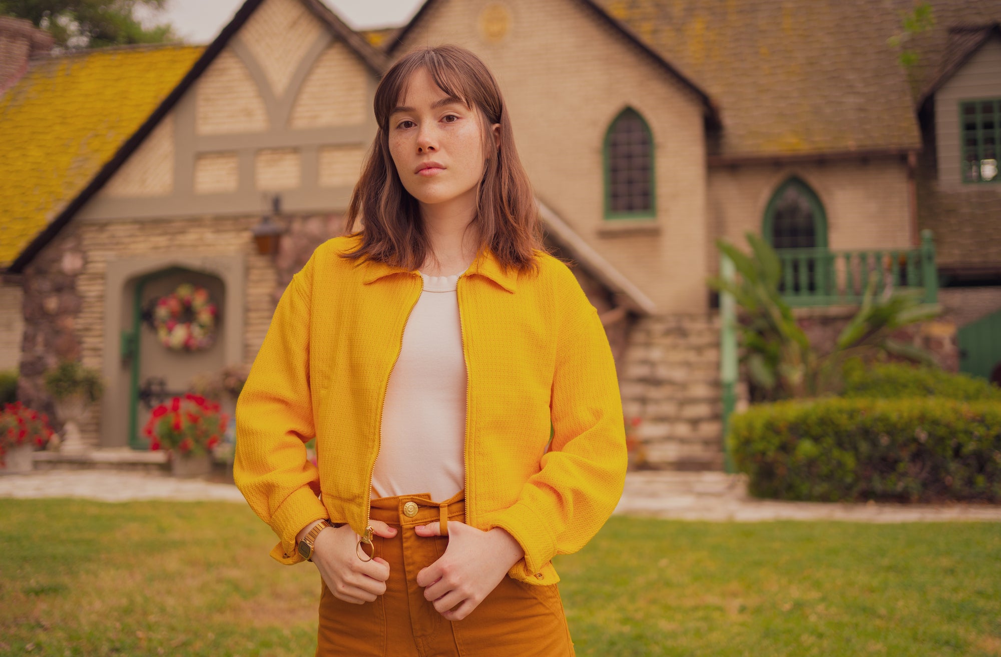 Hana is wearing Ricky Jacket in Sunshine Yellow, Tank Top in Vintage Off-White Tee, and Work Pants in Spicy Mustard