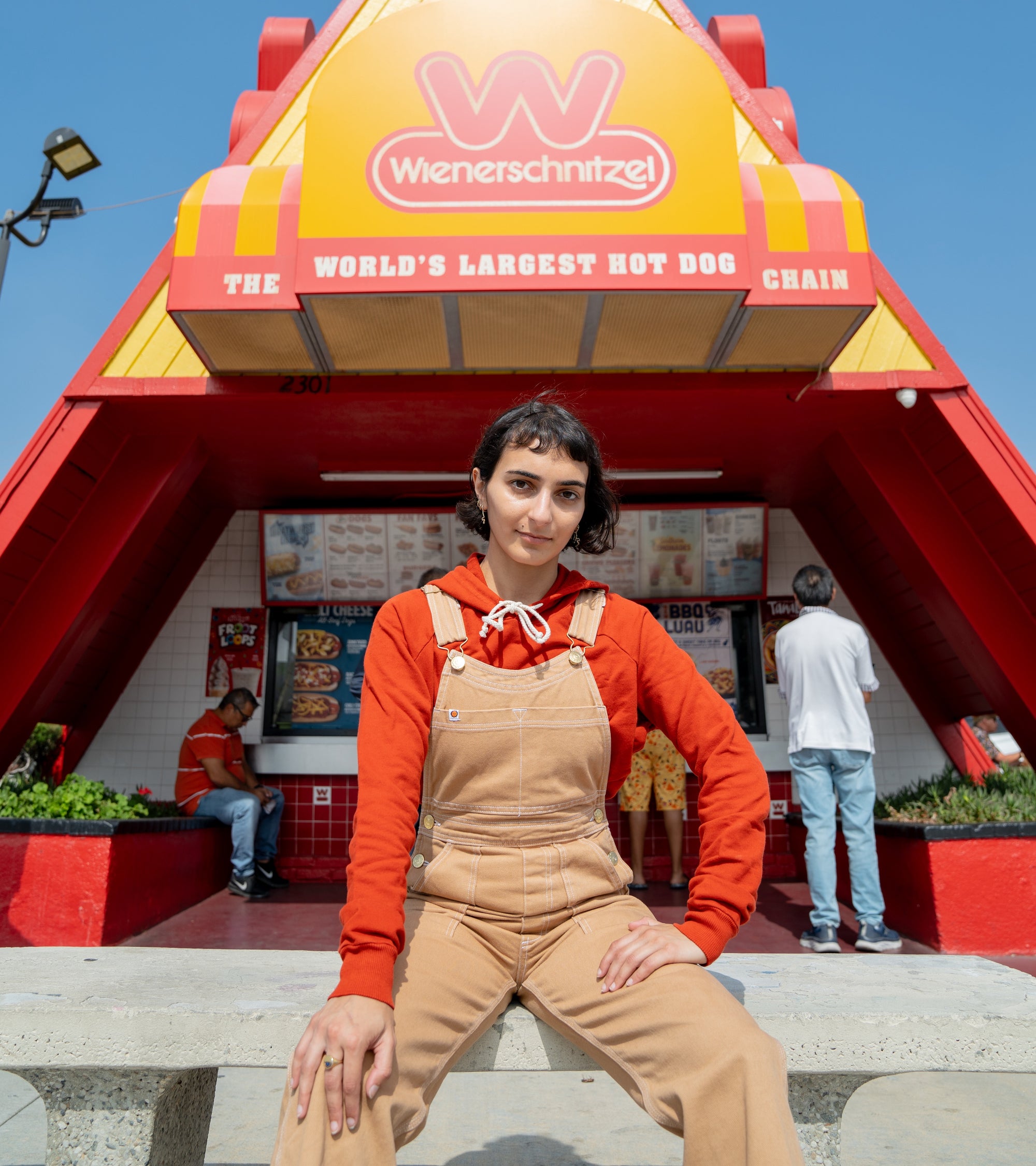 Soraya wearing Overalls in Tan and Classic Hoodie