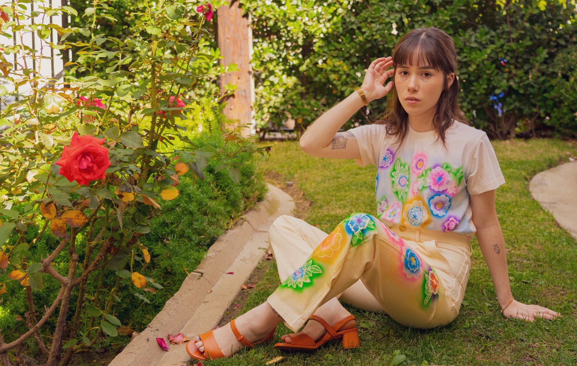 Hana is wearing Pantry Button-Up and Work Pants from the Lace Airbrush Collection