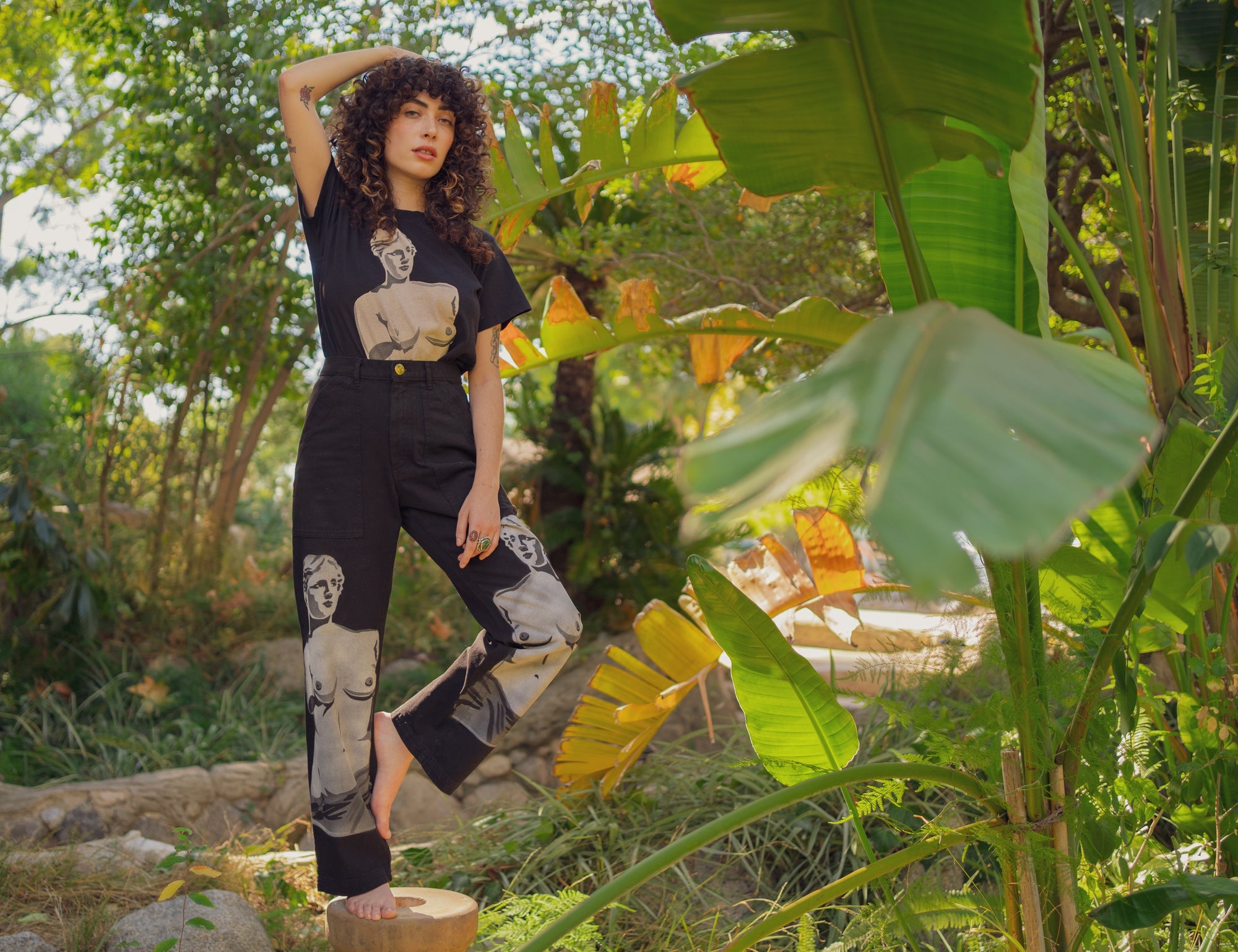 Rene Ferry is wearing Black Venus Organic Tee and Black Venus Work Pants