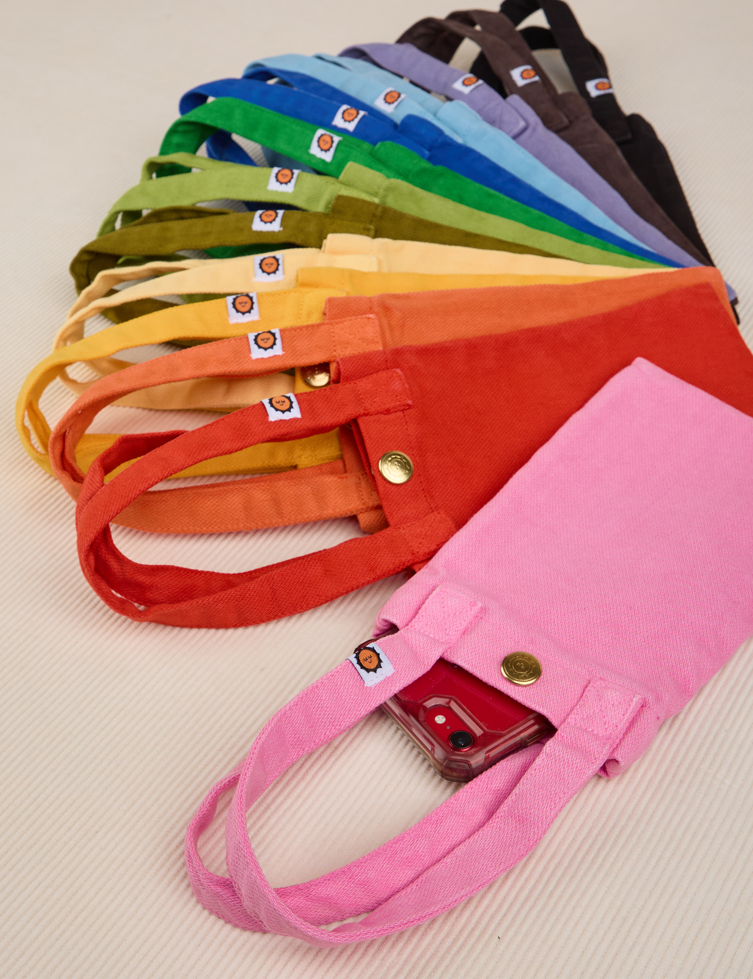 Cell Phone Totes in an array of colors
