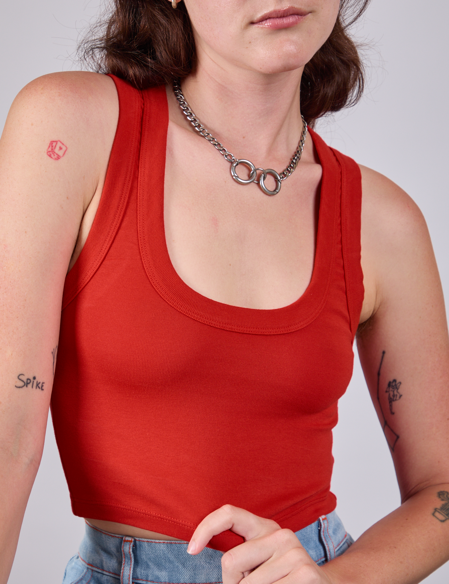 Close up of Cropped Tank Top in Mustang Red on Alex