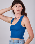 Alex is 5'8" and wearing P Cropped Tank Top in Royal Blue