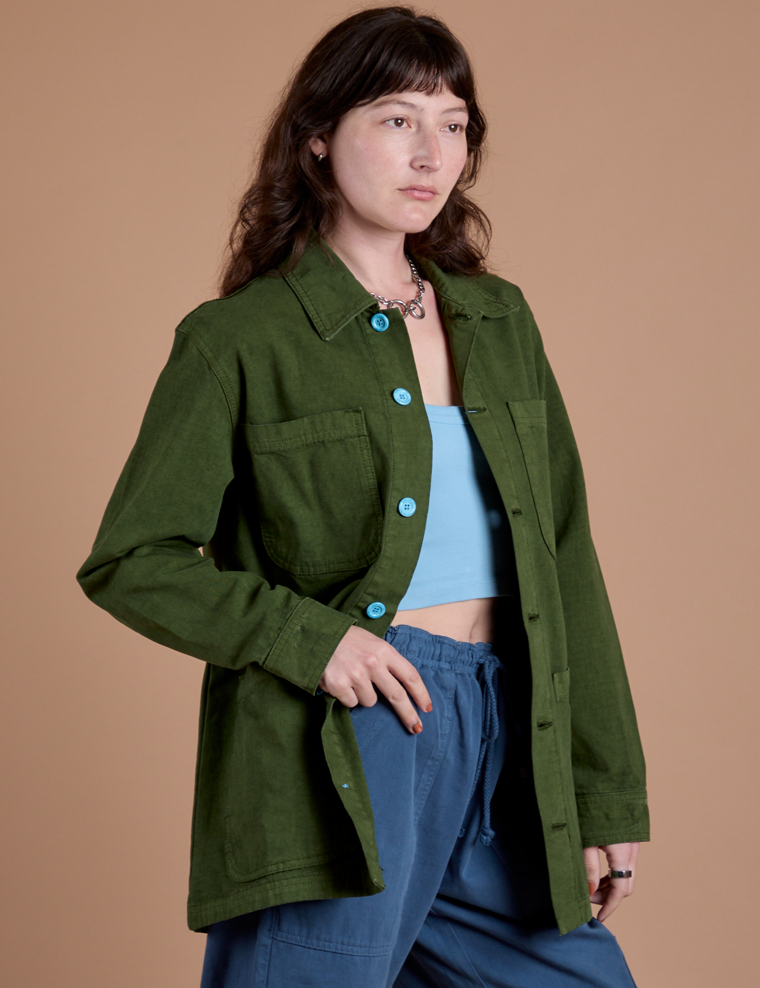 Alex is 5'8" and wearing XXS Ripstop Field Coat in Evergreen