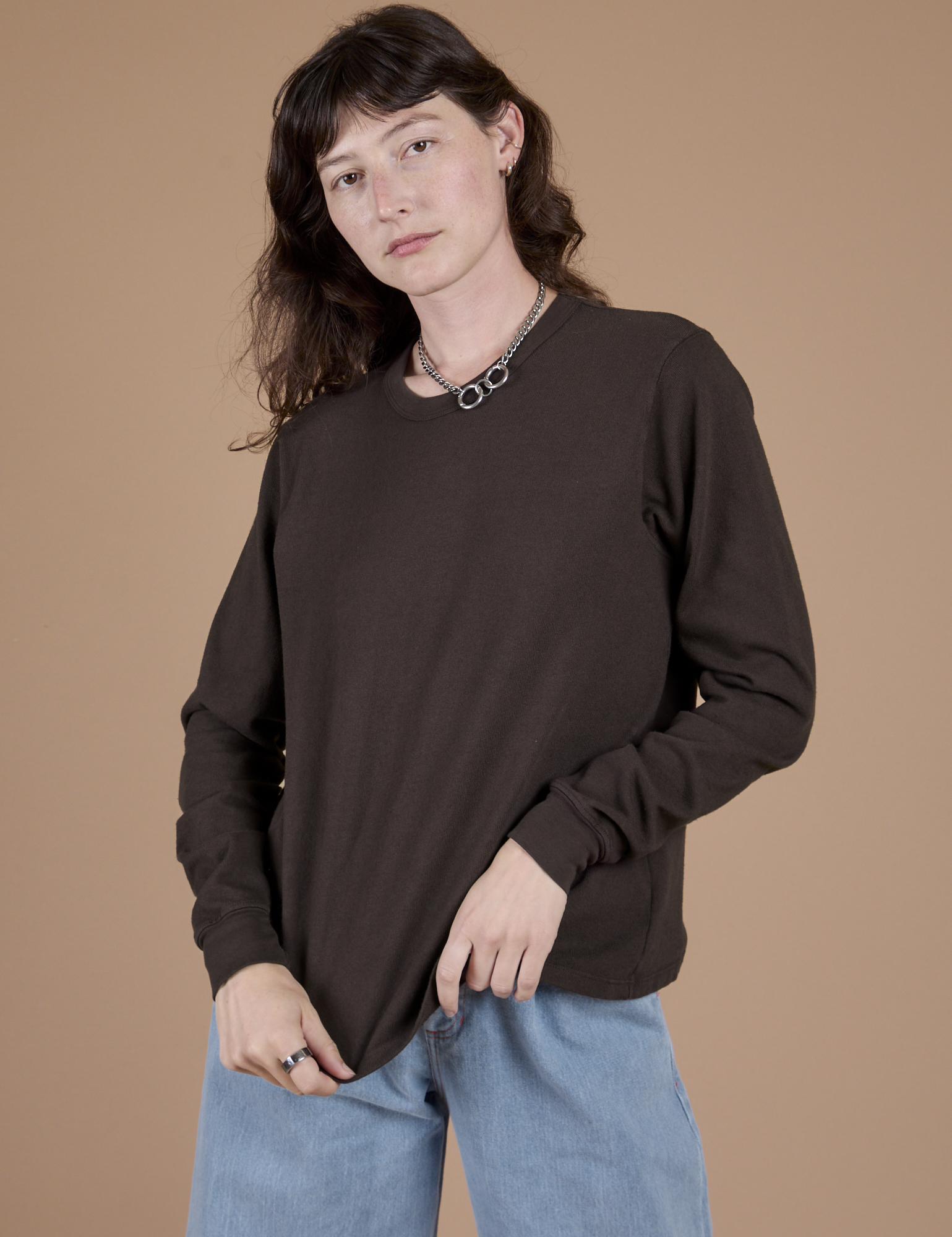 Alex is 5’8” and wearing P Long Sleeve Burly Tee in Espresso Brown