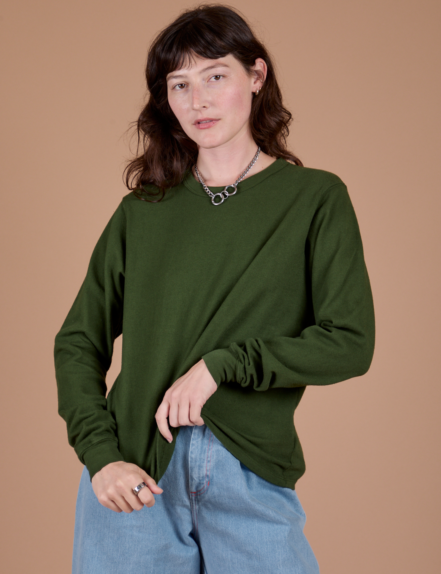Alex is 5’8” and wearing P Long Sleeve Burly Tee in Evergreen