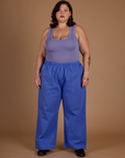 Kristen is 5'9" and wearing 2XL Cornflower Blue Action Pant with the Faded Grape Cropped Tank