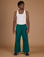 Isaac is 5'10" and wearing M Hunter Green Action Pant with the Vintage Tee Off-White Tank Top