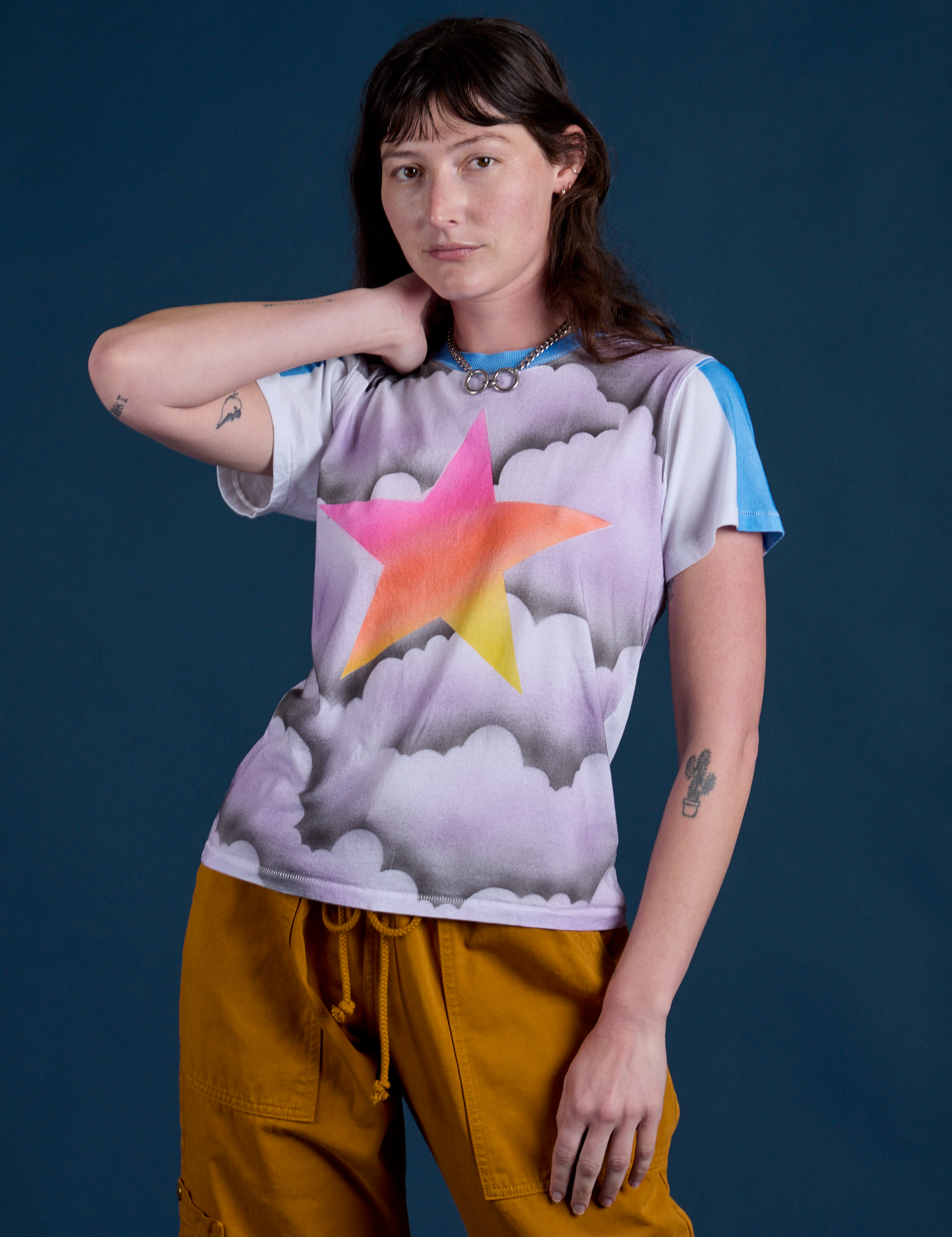 Alex is 5’8” and wearing P Airbrush Star Vintage Tee