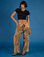 Kira is 5'10" and wearing XS Tiger Drop Pocket Pant with the Black Cropped Baby Tee