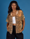 Kandia is 5'3" and wearing XXS Tiger Pantry Button Up