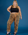 Juliet is 5'7" and wearing 2XL Tiger Work Pant with the Black Cropped Tank